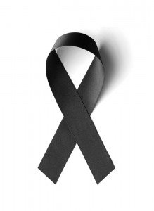 shutterstock_156724085 - grief black ribbon